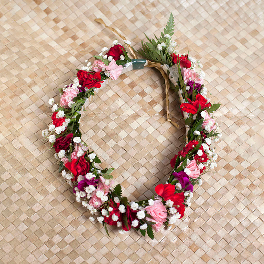 Floral haku lei available in assorted color combinations