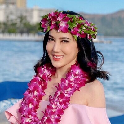 Orchid haku lei paired with a double strand orchid lei