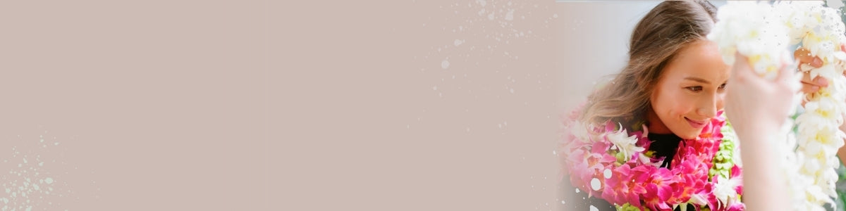 Woman with a floral wreath on a plain background