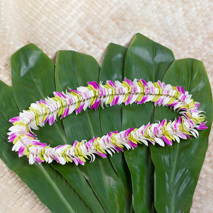 Butterfly-style lei made with a variety of orchid colors