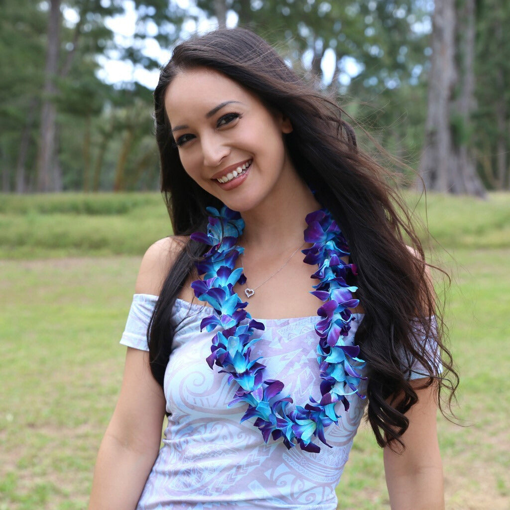 Single strand dyed orchid lei in vibrant color options 
