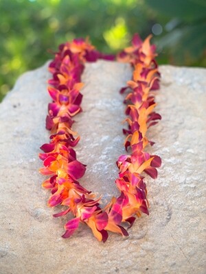 Single strand dyed orchid lei in vibrant color options 
