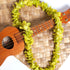 Single strand green orchid lei
