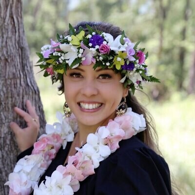 Orchid-only floral haku lei worn on the head