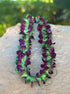 Single strand dyed orchid lei in vibrant color options