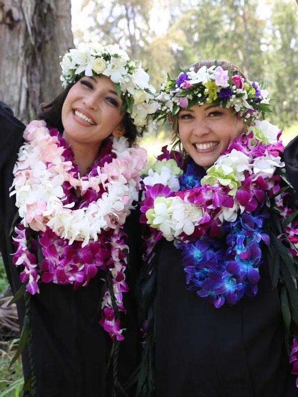 Women wearing floral leis and flower crowns in Hawaii