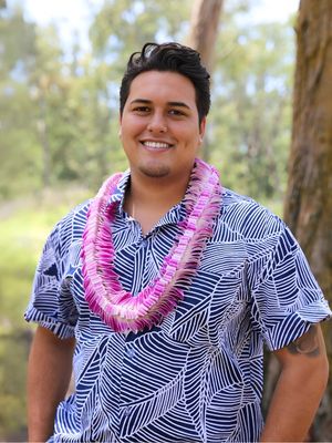 Purple orchid butterfly-style lei with wide flower arrangement